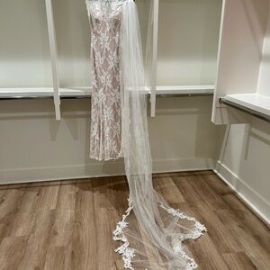 BHLDN wedding dress and cathedral veil